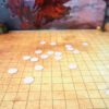 Wide view of blank game tokens in use.