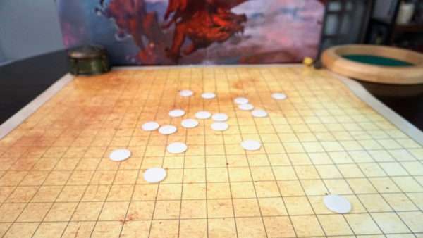 Wide view of blank game tokens in use.